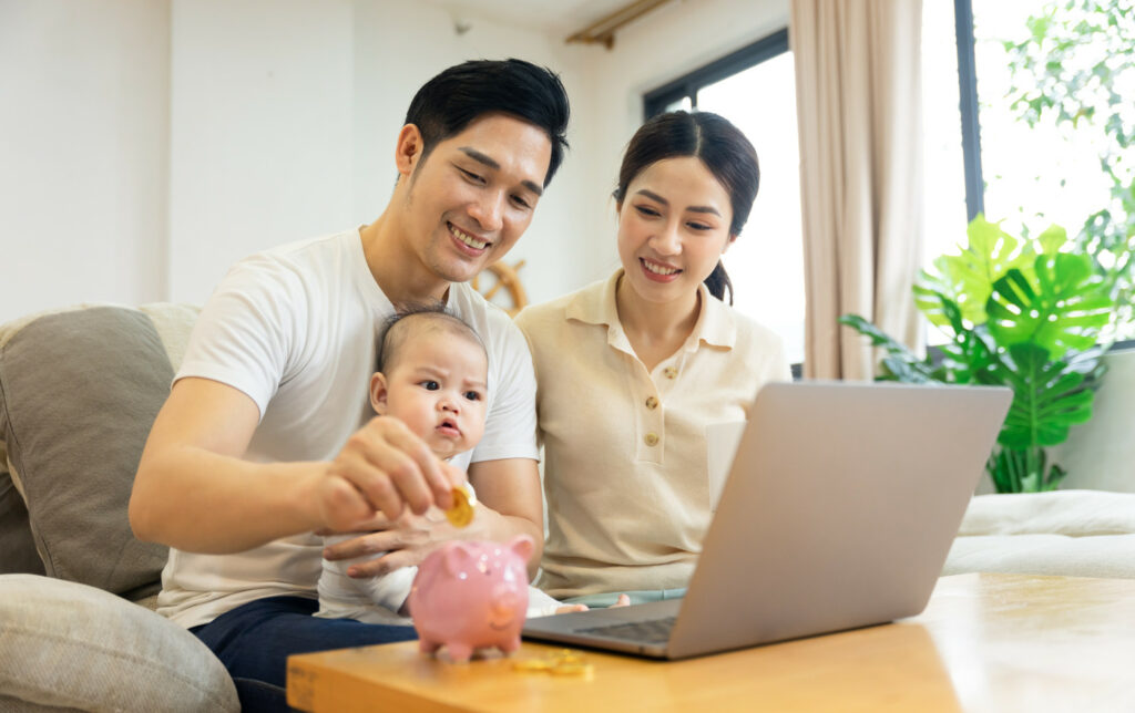 Family Opportunity Loans  - parents putting a coin into a piggy bank